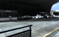 Broker-Dukes and FIA Police dealing with a disabled vehicle.