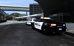 Broker-Dukes and FIA Police dealing with a disabled vehicle.