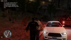Placing a Drunk driver suspect in the back of my cruiser.