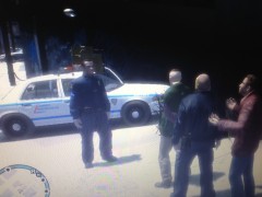 Male Suspect being detained.