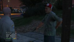 Gangbanger threating officer with Gun