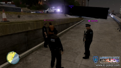 Arrest of a suspect who shortly before stole a bus and failed to stop for police (bus seen in the background on its side)