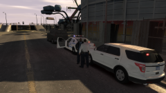 An LCPD K-9 Officer talks with a Supervisor.