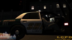 Officer Downcoldkiller of the LCSO checks a lic on his MDT