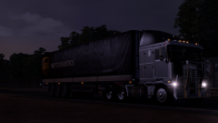 Kenworth K100 hauling a UPS Trailer