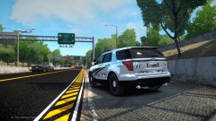 LIberty County Police officer watches a plane take off.