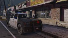 Sheriff Granger parked up at an incident at tattoo shop