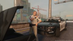 Highway patrol officer cleaning up scene after pursuit (2)