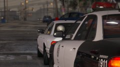 An LSPD officer following a Detective to a crime scene