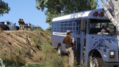 LASD officers investigating a prison bus escape