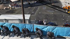 A N.O.O.S.E team waiting for the 'Go' on a takeover of a Ballas controlled area