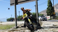 I can't believe he actually managed to drive under the sign..