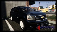 Tahoe In Parking Lot Of Lucky Plucker's