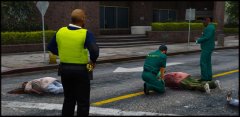 The unfortunate scene of paramedics attempting to revive one of the victims of a man who went on a short killing spree with a carving knife. Offender was shot and killed by responding firearms officers.