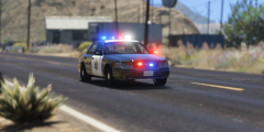 Marked Blaine County Sheriff CVPI responds code 3