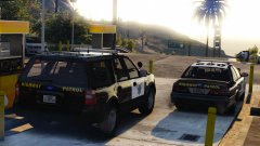 CHP Crown Victoria & CHP Expedition refueling at a gas station on Route 68