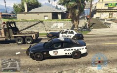 Towing police officer?!