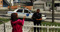 Miami Police Officer speaking with a witness