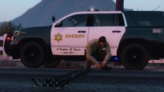 Setting up a spike strip!