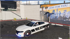 Dodge Charger at the station testing lights