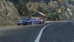 A Trooper checks on a disabled vehicle