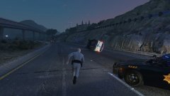 A Deputy blocks traffic with his vehicle and races to the aid of his partner, who has rolled his Tahoe while responding to a call