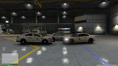 old design P.R. highway patrol in new cars