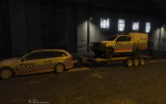 Holden Sportswagon towing a Toyota Hilux paddywagon