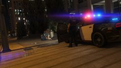 LAPD 2014 Dodge Charger Overlooking EMS Conducting CPR On An Injured Driver
