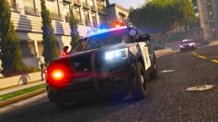 California Highway Patrol officers pursue a kidnapper in a blue sedan.