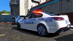 A/SGT Josh Brown helping a fellow officer with a traffic stop