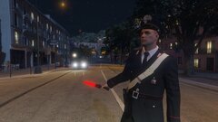 A Carabinieri directing traffic.