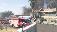 Dutch firefighters responding to a structure fire