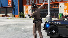 FHP Trooper Posing For A Photo Shoot Next To A 2016 Dodge Charger