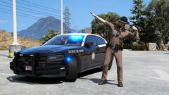 FHP Trooper Posing For A Photo Shoot Next To A 2016 Dodge Charger