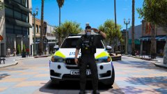 South Wales Police Joint Firearms Unit's Sergeant Turner Saluting a Fallen