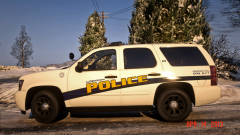 2013 Chevrolet Tahoe -- Side.png