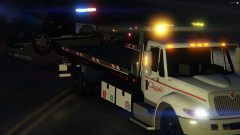 Classic Towing assisting the O.P.P. with a rollover in Mt Forest