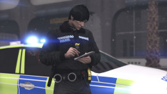 Local Policing Officer taking a Statement in the cold