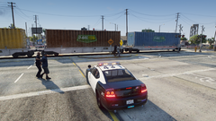 cop almost hit by train.png