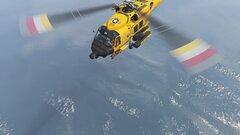 Coast guard helicopter during training