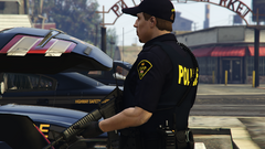 OPP Officer holding rifle