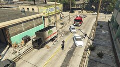 Greek police and fire service at the scene of a car bomb explosion