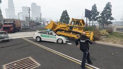 Chase of a bulldozer leads to a police car getting destroyed
