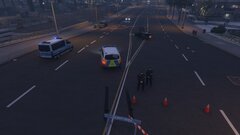 German police responding to a car bomb threat [2/3]