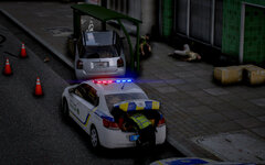 Peugeot 301 of the Ukrainian patrol police on scene with victims