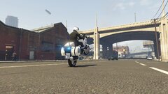 Greek police officer pulling a wellie.