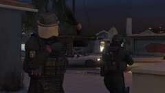 Greek ekam anti terror operatives in the middle of a raid