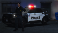 Toronto Police Officer Stands Infront Of a Marked TPS Ford Explorer