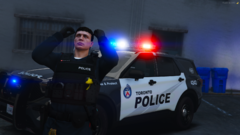 Toronto Police Officer Stands Infront Of a Marked TPS Ford Explorer
